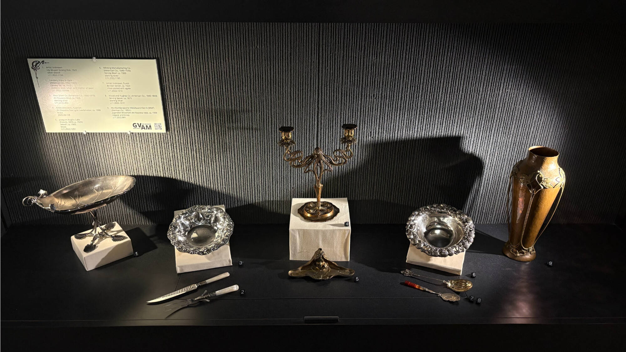 Interior of the case showcasing the exhibition, La Danse des Métaux